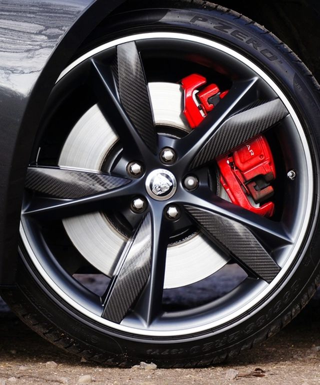 Alloy wheel with a freshly painted red brake calliper